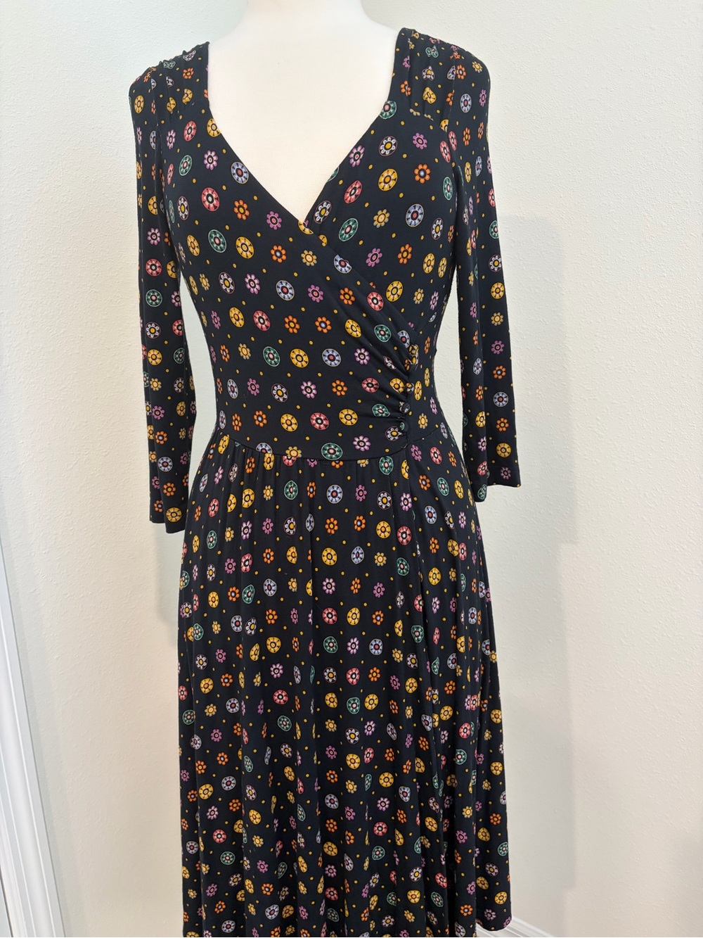 Maeve by Antropologie Black Floral Dot Wrap Midi with Long Sleeves.